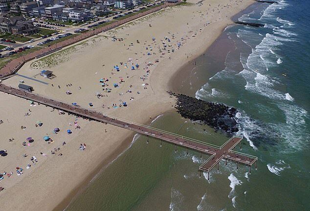 Outraged citizens demand answers after town builds cross-shaped pier